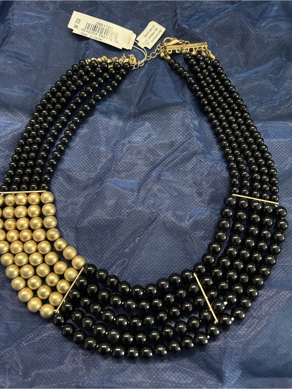 Multi-Strand Black Bead Statement Necklace with Gold Accent